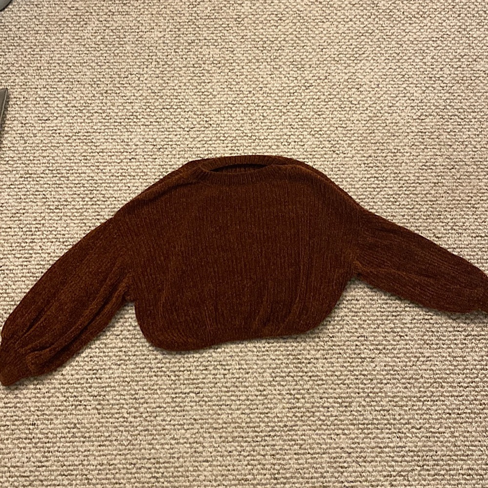 soft felt maroon long sleeved shirt.